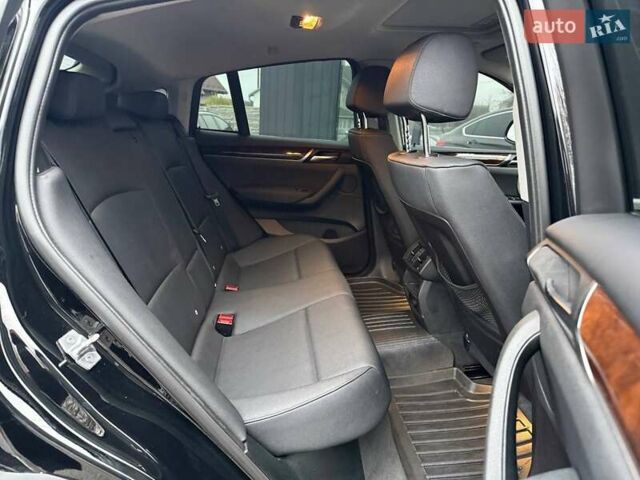 Черный БМВ Х4, объемом двигателя 2 л и пробегом 176 тыс. км за 19900 $, фото 21 на Automoto.ua