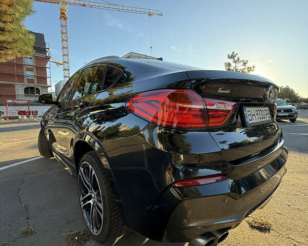 Чорний БМВ Х4, об'ємом двигуна 2 л та пробігом 97 тис. км за 25500 $, фото 2 на Automoto.ua