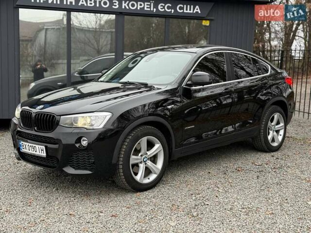 Черный БМВ Х4, объемом двигателя 2 л и пробегом 176 тыс. км за 19900 $, фото 1 на Automoto.ua