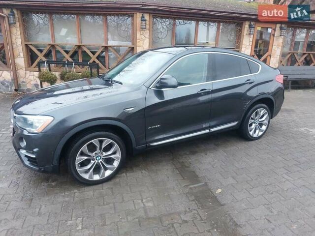 Черный БМВ Х4, объемом двигателя 2 л и пробегом 256 тыс. км за 14800 $, фото 15 на Automoto.ua