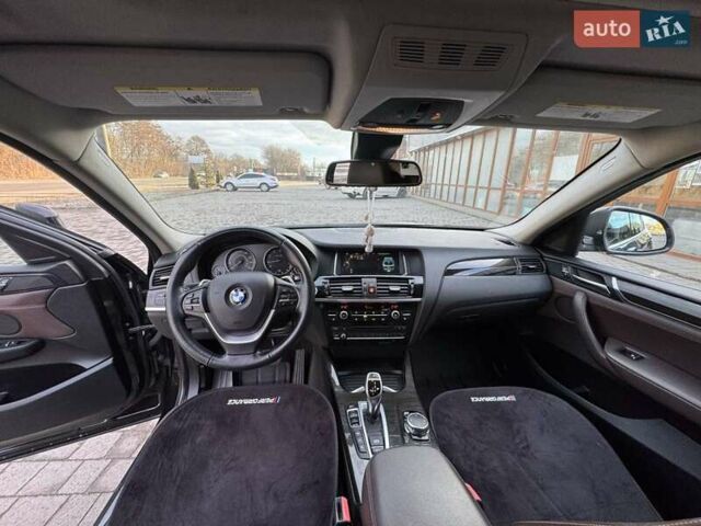 Чорний БМВ Х4, об'ємом двигуна 2 л та пробігом 98 тис. км за 27000 $, фото 2 на Automoto.ua