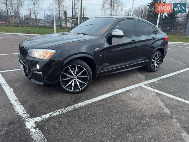Черный БМВ Х4, объемом двигателя 2.98 л и пробегом 77 тыс. км за 33800 $, фото 3 на Automoto.ua