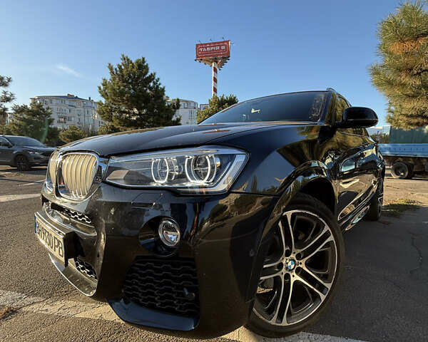 Чорний БМВ Х4, об'ємом двигуна 2 л та пробігом 97 тис. км за 25500 $, фото 3 на Automoto.ua