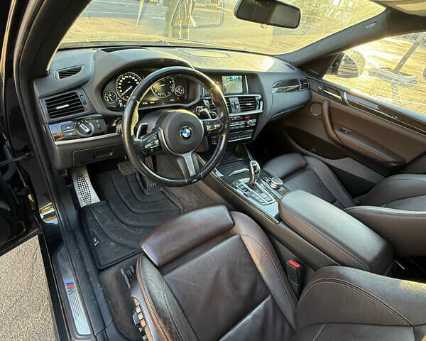 Чорний БМВ Х4, об'ємом двигуна 2 л та пробігом 97 тис. км за 25500 $, фото 6 на Automoto.ua