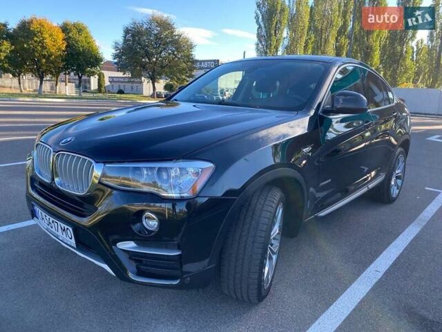 БМВ Х4 2016 у Києві на Automoto.ua Чорний БМВ Х4, об'ємом двигуна 2 л та пробігом 77 тис. км за 21500 $, фото 1 на Automoto.ua
