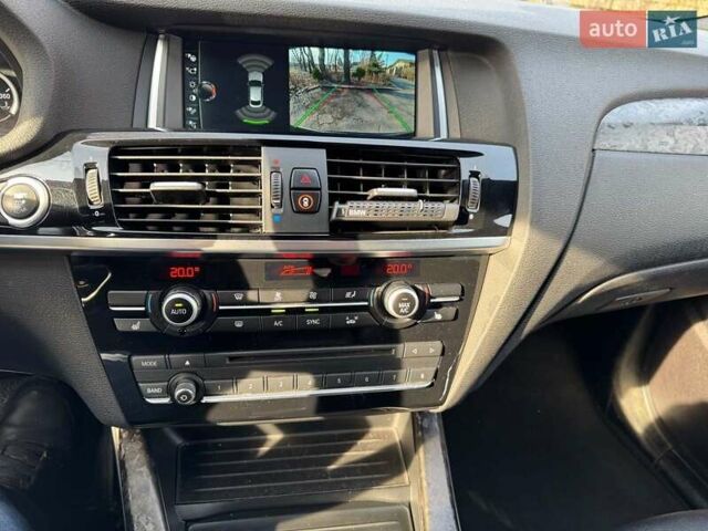 Черный БМВ Х4, объемом двигателя 3 л и пробегом 125 тыс. км за 28290 $, фото 14 на Automoto.ua
