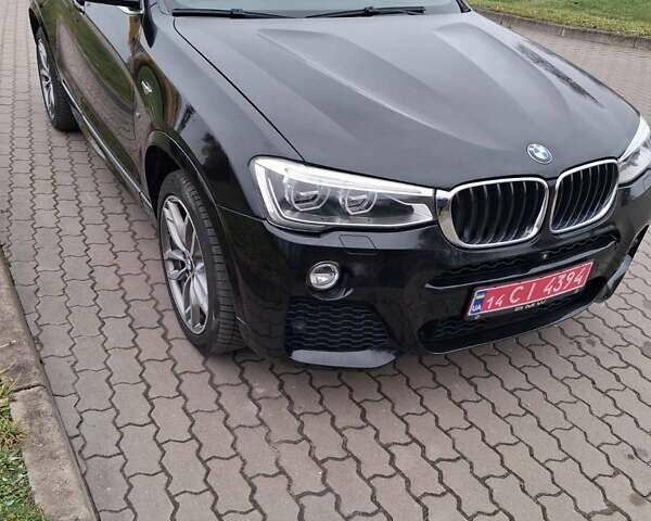 Черный БМВ Х4, объемом двигателя 2 л и пробегом 231 тыс. км за 26500 $, фото 1 на Automoto.ua