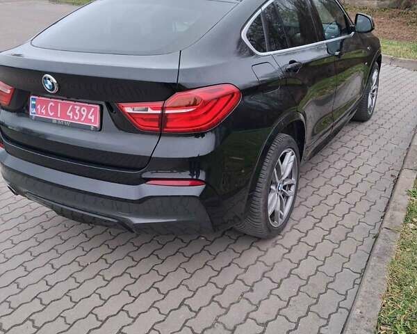 Черный БМВ Х4, объемом двигателя 2 л и пробегом 231 тыс. км за 26500 $, фото 3 на Automoto.ua