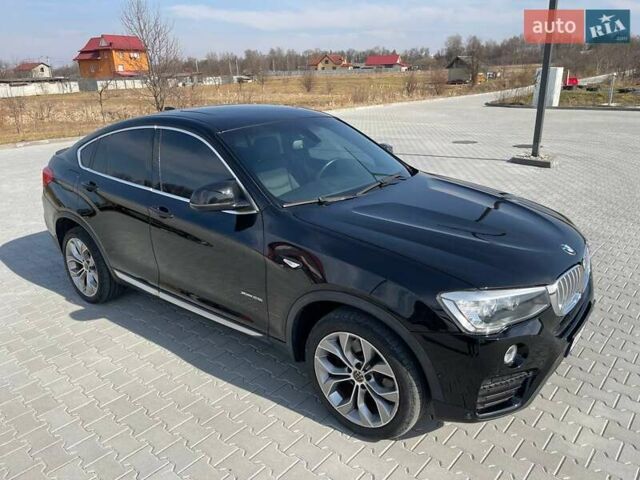 Черный БМВ Х4, объемом двигателя 2 л и пробегом 201 тыс. км за 17800 $, фото 3 на Automoto.ua