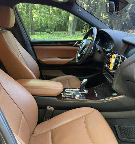 Черный БМВ Х4, объемом двигателя 2 л и пробегом 171 тыс. км за 27700 $, фото 16 на Automoto.ua