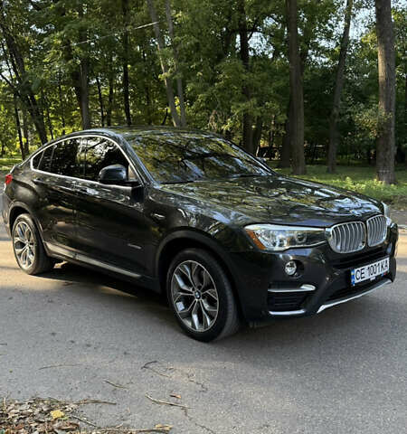 Черный БМВ Х4, объемом двигателя 2 л и пробегом 171 тыс. км за 27700 $, фото 25 на Automoto.ua