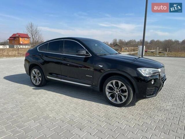 Черный БМВ Х4, объемом двигателя 2 л и пробегом 201 тыс. км за 17800 $, фото 4 на Automoto.ua