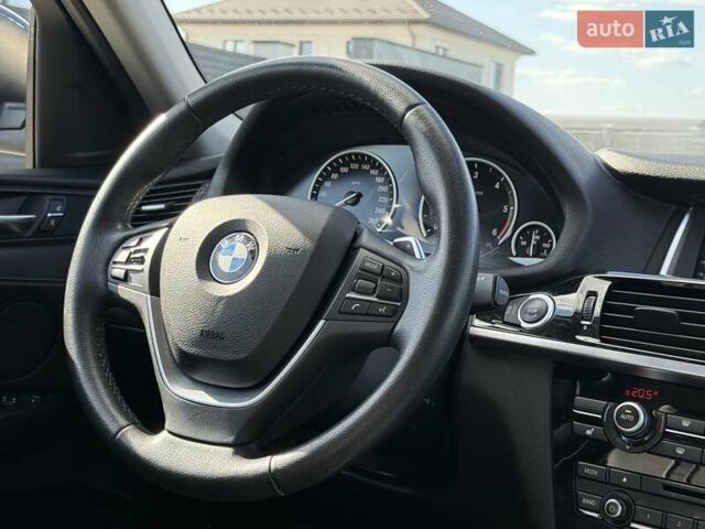 Черный БМВ Х4, объемом двигателя 2 л и пробегом 101 тыс. км за 27500 $, фото 23 на Automoto.ua