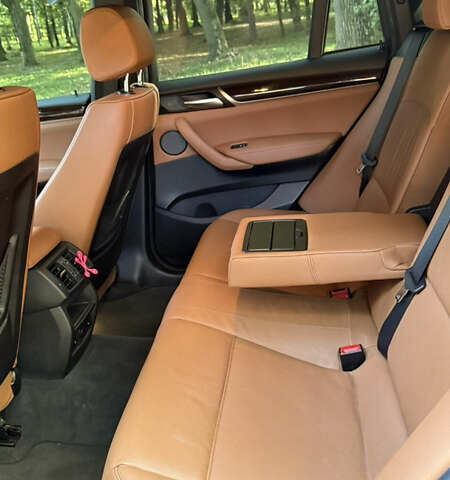 Черный БМВ Х4, объемом двигателя 2 л и пробегом 171 тыс. км за 27700 $, фото 2 на Automoto.ua