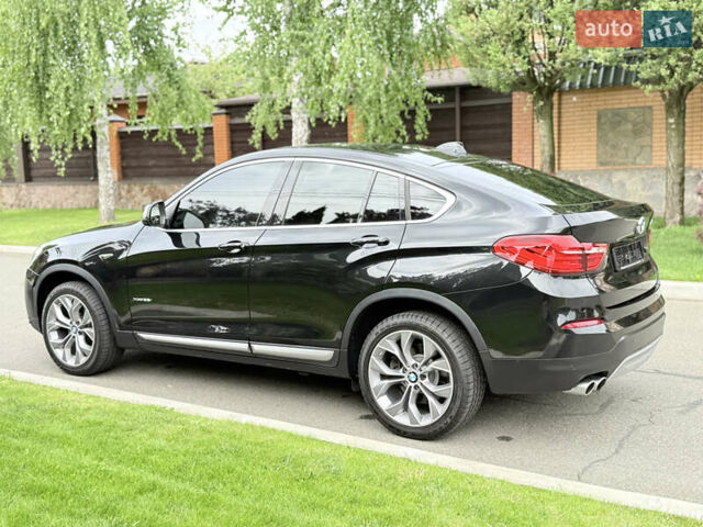 Черный БМВ Х4, объемом двигателя 2 л и пробегом 91 тыс. км за 25700 $, фото 18 на Automoto.ua