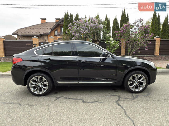 Черный БМВ Х4, объемом двигателя 2 л и пробегом 91 тыс. км за 25700 $, фото 20 на Automoto.ua