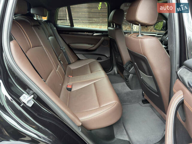 Черный БМВ Х4, объемом двигателя 2 л и пробегом 91 тыс. км за 25700 $, фото 7 на Automoto.ua