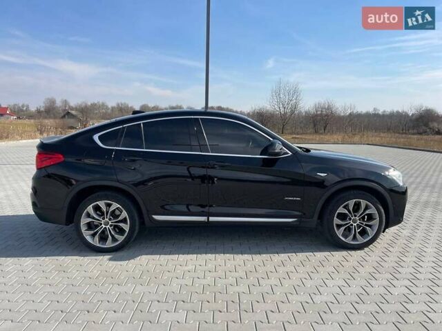 Черный БМВ Х4, объемом двигателя 2 л и пробегом 201 тыс. км за 17800 $, фото 5 на Automoto.ua