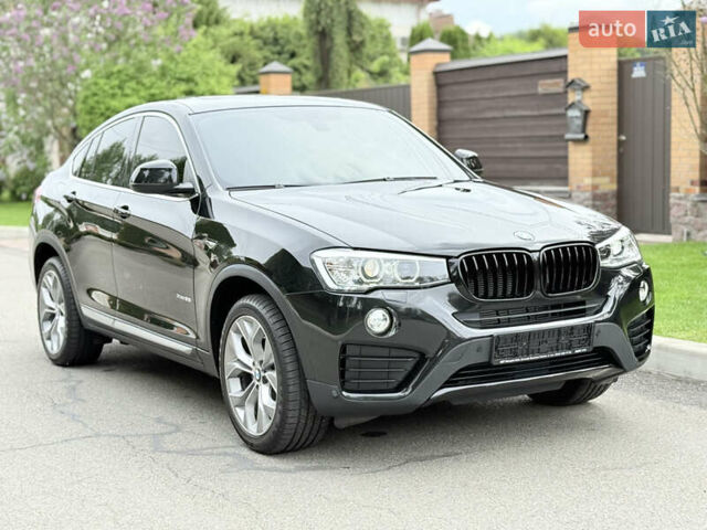 Черный БМВ Х4, объемом двигателя 2 л и пробегом 91 тыс. км за 25700 $, фото 21 на Automoto.ua