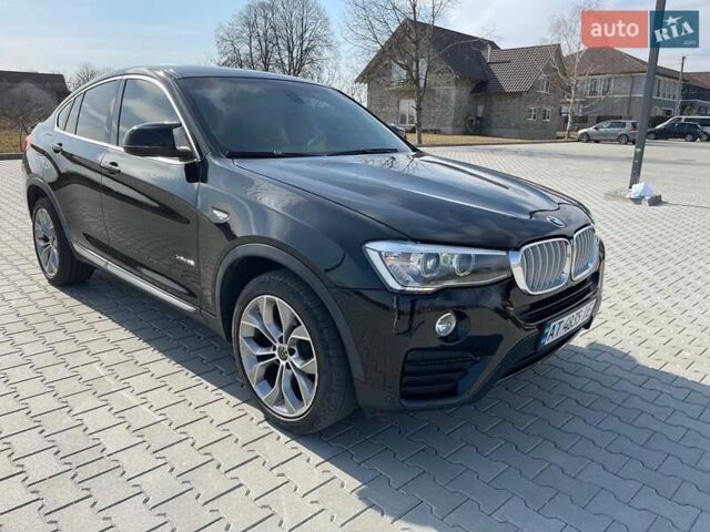 Черный БМВ Х4, объемом двигателя 2 л и пробегом 201 тыс. км за 17800 $, фото 1 на Automoto.ua