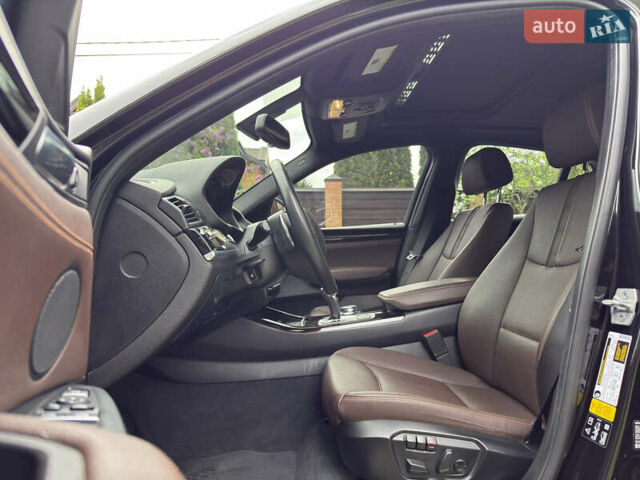 Черный БМВ Х4, объемом двигателя 2 л и пробегом 91 тыс. км за 25700 $, фото 15 на Automoto.ua