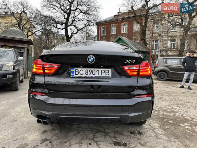 Черный БМВ Х4, объемом двигателя 2 л и пробегом 120 тыс. км за 24100 $, фото 10 на Automoto.ua