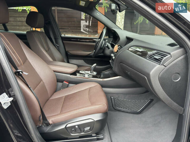 Черный БМВ Х4, объемом двигателя 2 л и пробегом 91 тыс. км за 25700 $, фото 6 на Automoto.ua