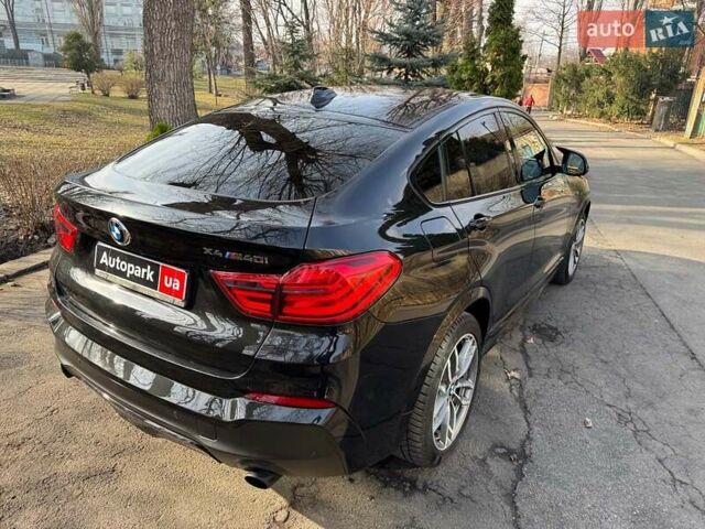 Черный БМВ Х4, объемом двигателя 3 л и пробегом 125 тыс. км за 28290 $, фото 6 на Automoto.ua