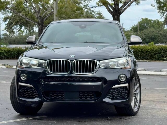 Чорний БМВ Х4, об'ємом двигуна 3 л та пробігом 37 тис. км за 19900 $, фото 1 на Automoto.ua