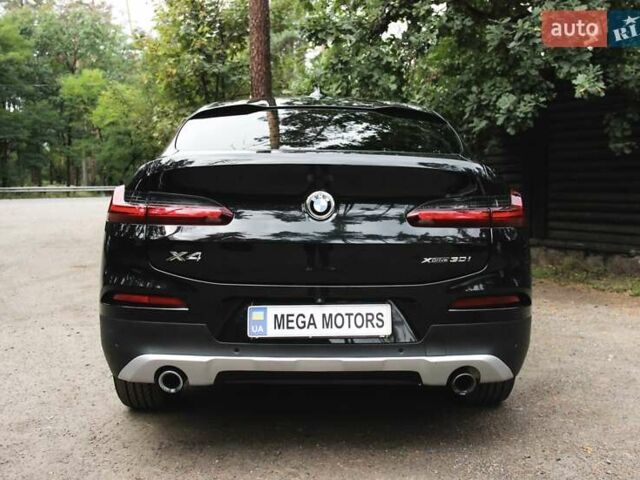 Черный БМВ Х4, объемом двигателя 2 л и пробегом 65 тыс. км за 39990 $, фото 6 на Automoto.ua