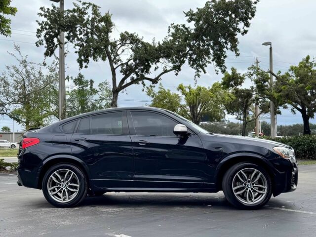 Чорний БМВ Х4, об'ємом двигуна 3 л та пробігом 37 тис. км за 19900 $, фото 7 на Automoto.ua