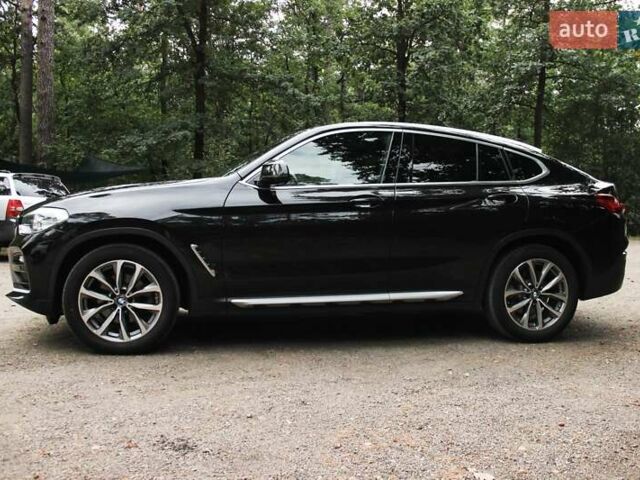 Черный БМВ Х4, объемом двигателя 2 л и пробегом 65 тыс. км за 39990 $, фото 2 на Automoto.ua