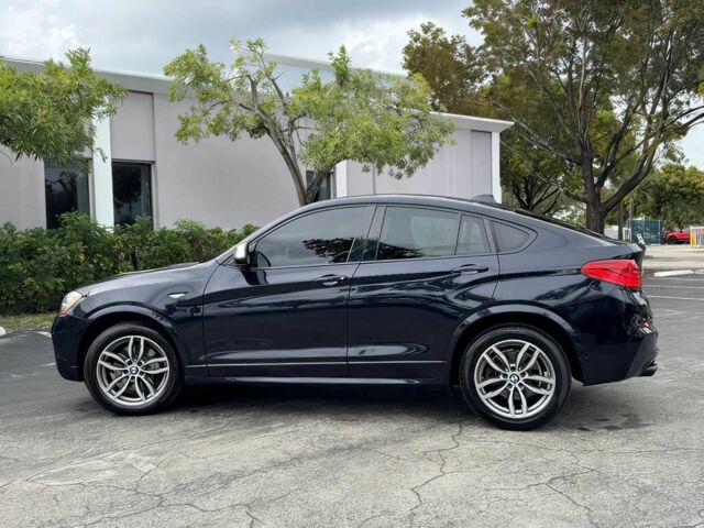 Черный БМВ Х4, объемом двигателя 3 л и пробегом 48 тыс. км за 16700 $, фото 2 на Automoto.ua