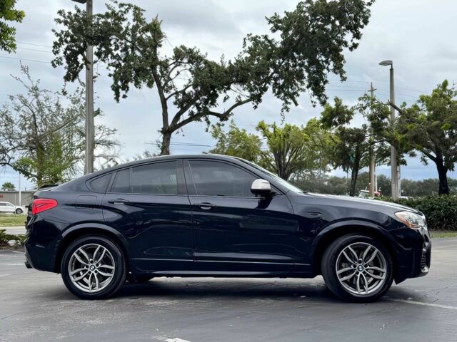 Черный БМВ Х4, объемом двигателя 3 л и пробегом 48 тыс. км за 16700 $, фото 6 на Automoto.ua