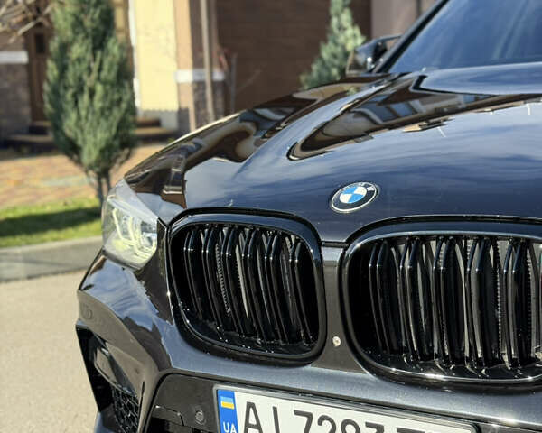 Черный БМВ Х4, объемом двигателя 2 л и пробегом 99 тыс. км за 39999 $, фото 4 на Automoto.ua