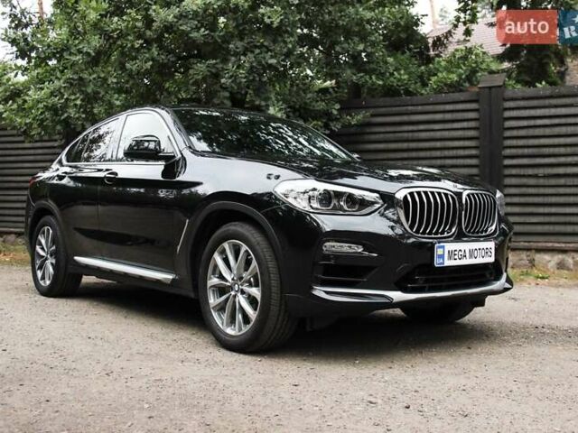 Черный БМВ Х4, объемом двигателя 2 л и пробегом 65 тыс. км за 39990 $, фото 3 на Automoto.ua
