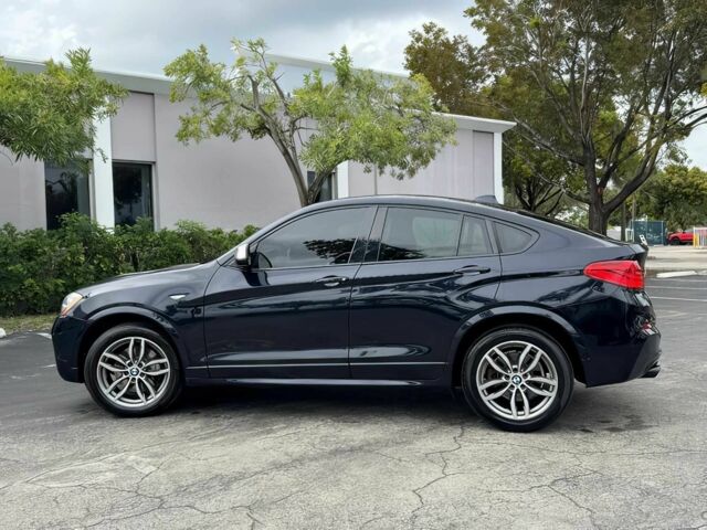 Чорний БМВ Х4, об'ємом двигуна 3 л та пробігом 37 тис. км за 19900 $, фото 3 на Automoto.ua