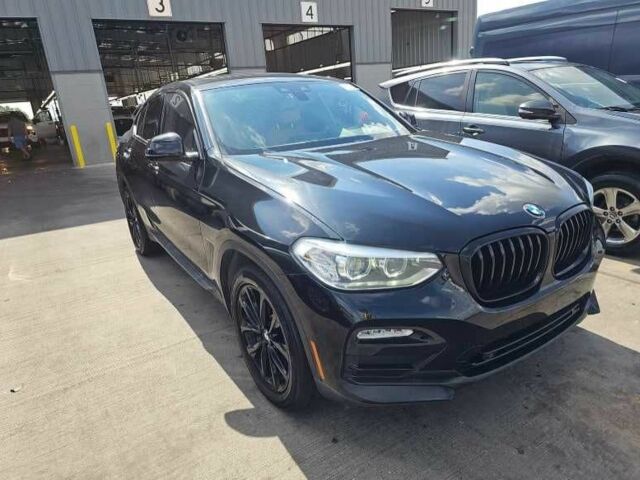 Черный БМВ Х4, объемом двигателя 0 л и пробегом 76 тыс. км за 20000 $, фото 1 на Automoto.ua