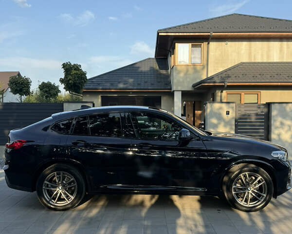 Черный БМВ Х4, объемом двигателя 2 л и пробегом 259 тыс. км за 34900 $, фото 4 на Automoto.ua