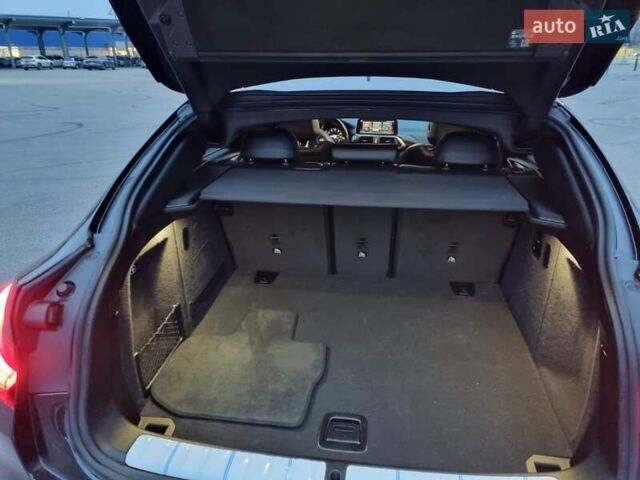 Чорний БМВ Х4, об'ємом двигуна 2 л та пробігом 96 тис. км за 40000 $, фото 4 на Automoto.ua