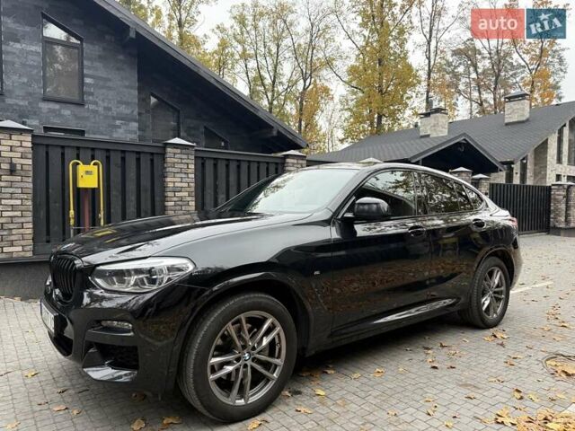 Чорний БМВ Х4, об'ємом двигуна 2 л та пробігом 94 тис. км за 41000 $, фото 1 на Automoto.ua