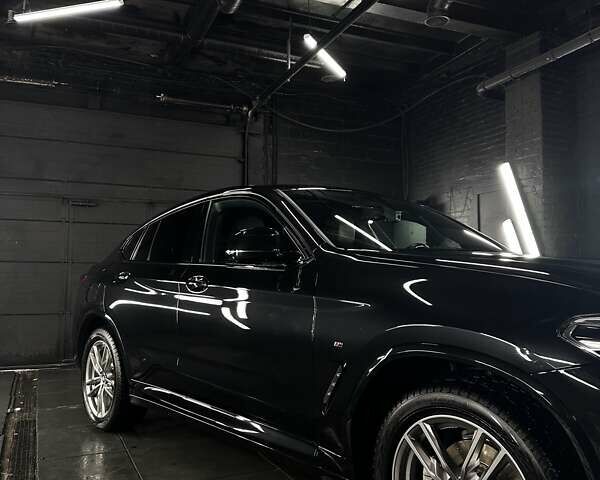 Чорний БМВ Х4, об'ємом двигуна 2 л та пробігом 70 тис. км за 49750 $, фото 1 на Automoto.ua