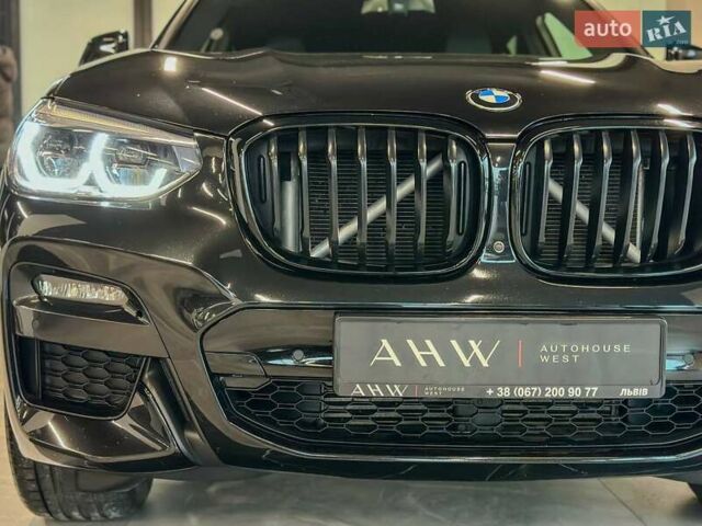 Черный БМВ Х4, объемом двигателя 2 л и пробегом 54 тыс. км за 54900 $, фото 2 на Automoto.ua