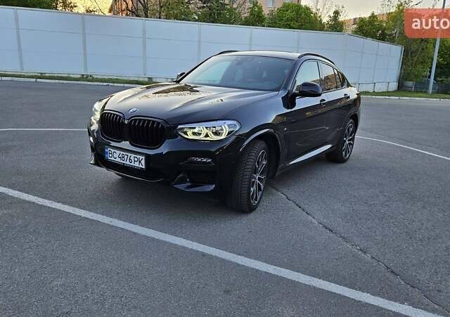 Черный БМВ Х4, объемом двигателя 3 л и пробегом 128 тыс. км за 60000 $, фото 4 на Automoto.ua