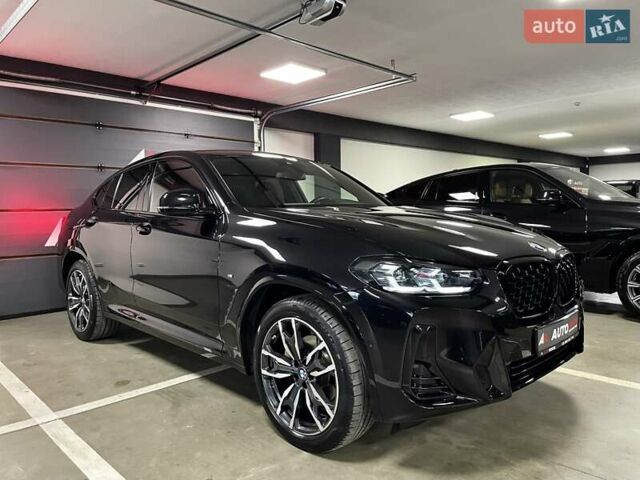 Черный БМВ Х4, объемом двигателя 2 л и пробегом 13 тыс. км за 67700 $, фото 1 на Automoto.ua