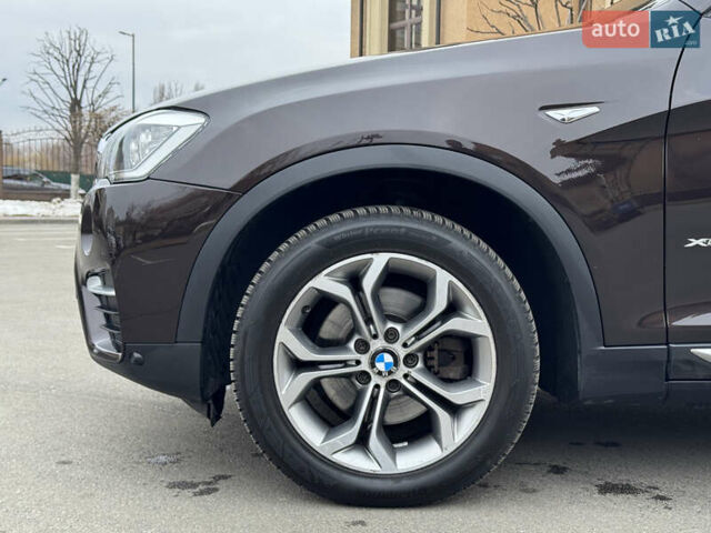 Коричневый БМВ Х4, объемом двигателя 2.99 л и пробегом 122 тыс. км за 24500 $, фото 5 на Automoto.ua