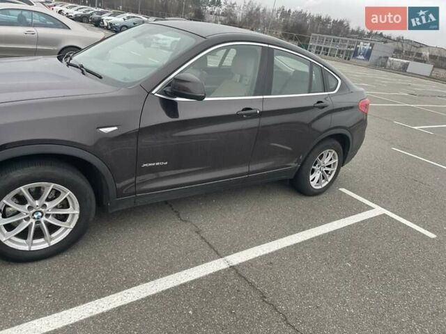 Коричневий БМВ Х4, об'ємом двигуна 2 л та пробігом 154 тис. км за 23700 $, фото 4 на Automoto.ua