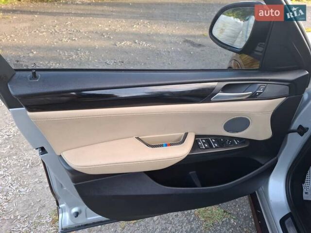 Коричневый БМВ Х4, объемом двигателя 2.98 л и пробегом 143 тыс. км за 27999 $, фото 1 на Automoto.ua