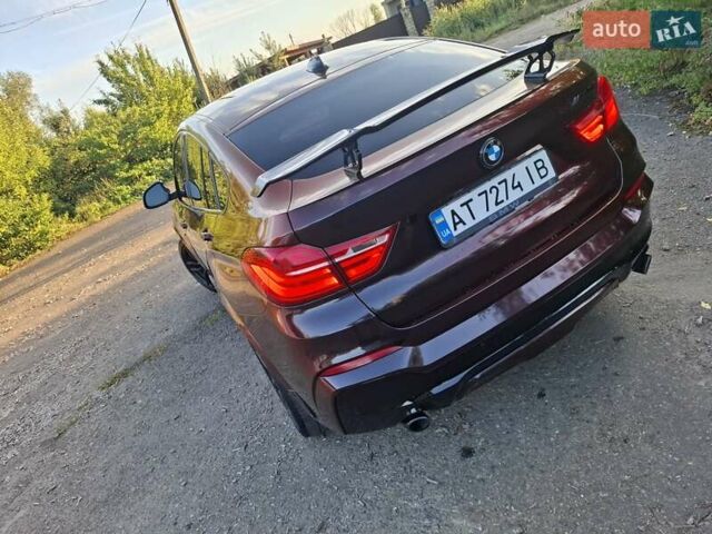 Коричневый БМВ Х4, объемом двигателя 2.98 л и пробегом 143 тыс. км за 27999 $, фото 12 на Automoto.ua