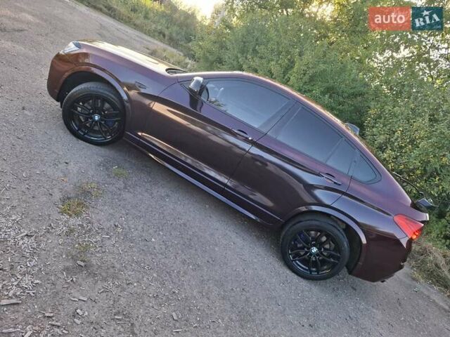 Коричневий БМВ Х4, об'ємом двигуна 3 л та пробігом 143 тис. км за 33777 $, фото 14 на Automoto.ua
